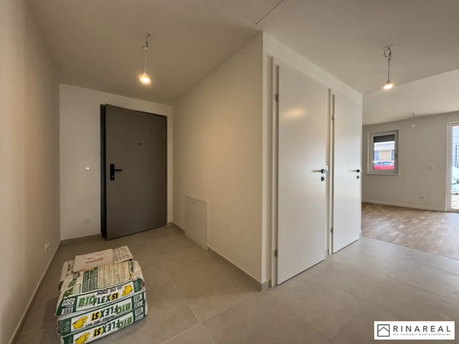 Traumhafte 3 Zimmer Gartenwohnung | Blumengasse - ERSTBEZUG | ca. 23 m² Terrasse & ung.150 m² Eigengarten | zzgl. Tiefgaragenstellplatz | Top D4