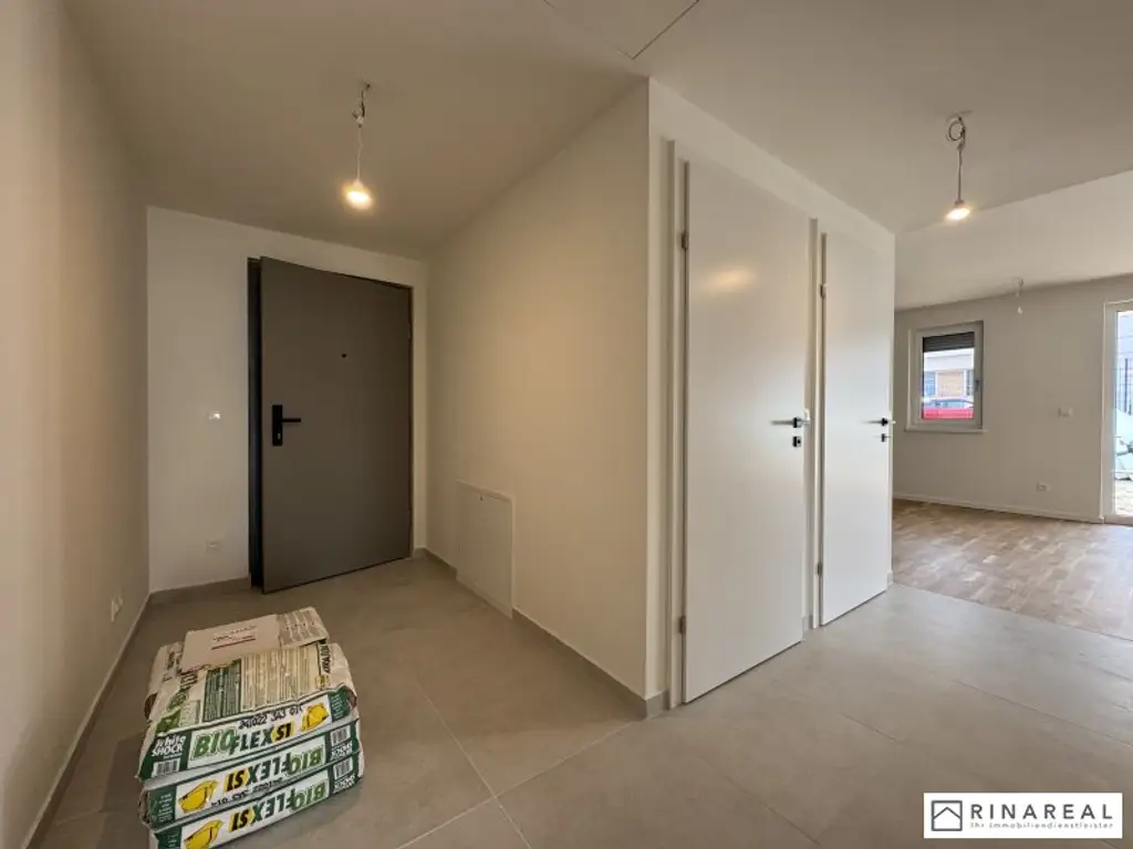Traumhafte 3 Zimmer Gartenwohnung | Blumengasse - ERSTBEZUG | ca. 23 m² Terrasse & ung.150 m² Eigengarten | zzgl. Tiefgaragenstellplatz | Top D4