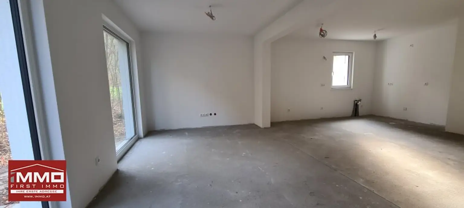 ***ERSTBEZUGS-DOPPELHAUSHÄLFTE DIREKT AM WASSER MIT SÜD-GARTEN!***