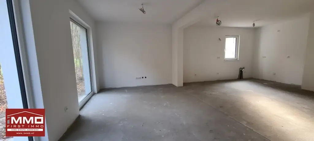 ***ERSTBEZUGS-DOPPELHAUSHÄLFTE DIREKT AM WASSER MIT SÜD-GARTEN!***