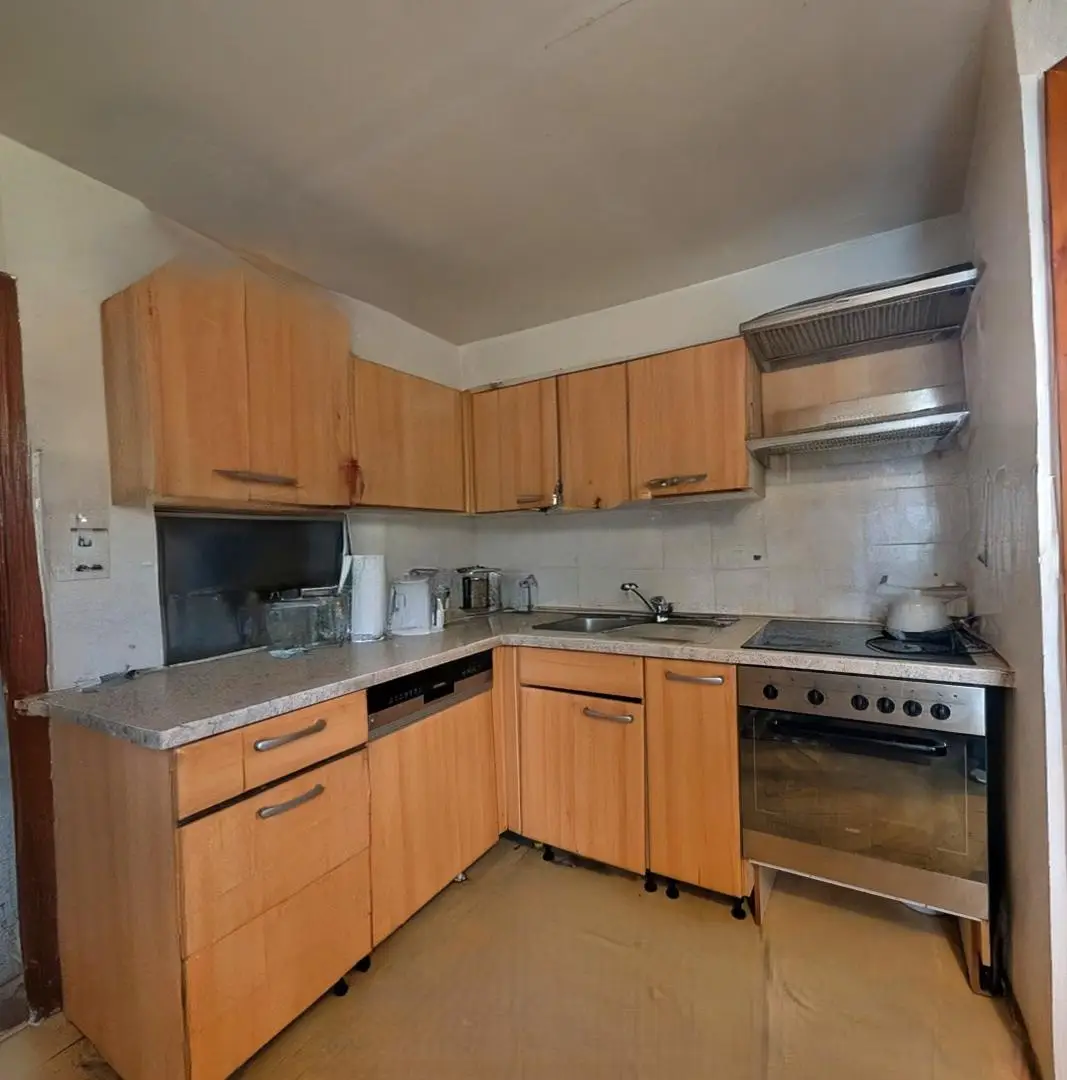 Sanierungsbedürftiger Bungalow mit großem Grundstück - in ruhiger, sonniger Lage