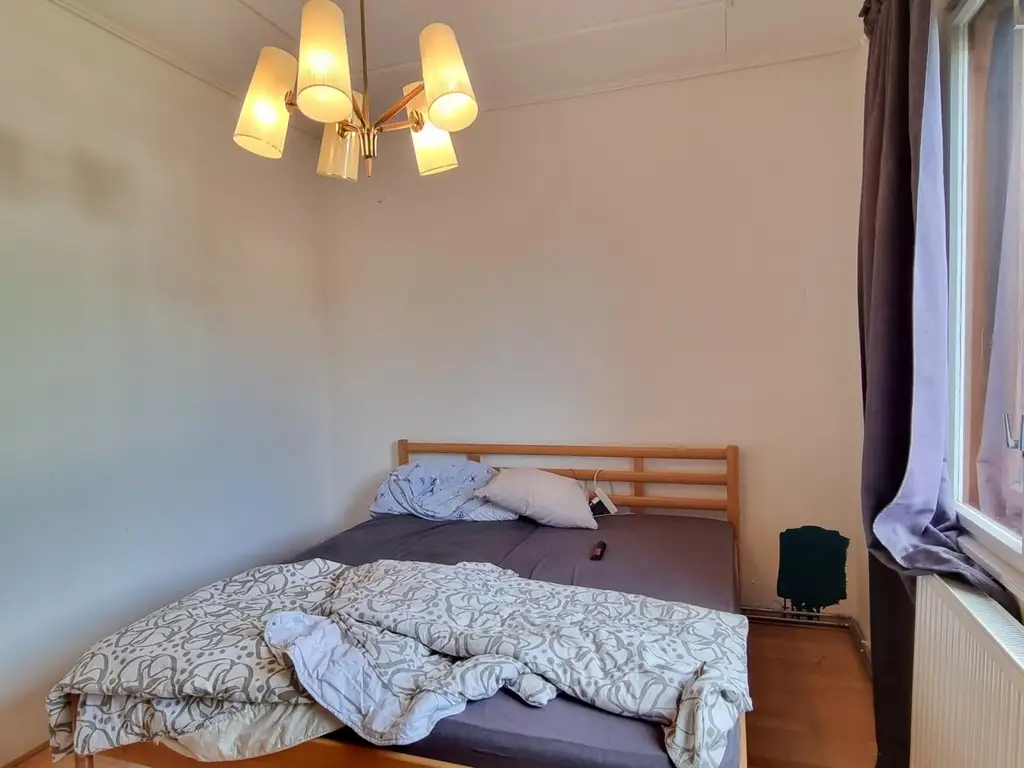 GERÄUMIGES EIN / ZWEIFAMILIENHAUS IN SONNIGER LAGE