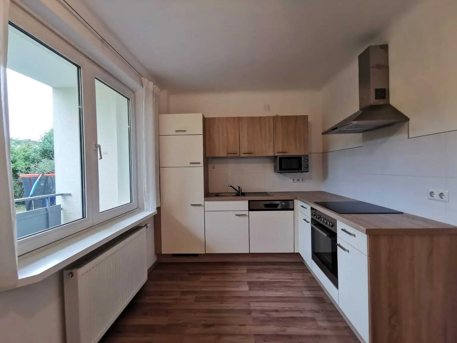Sonnige 3 Zimmer Wohnung mit Gartenbenützung