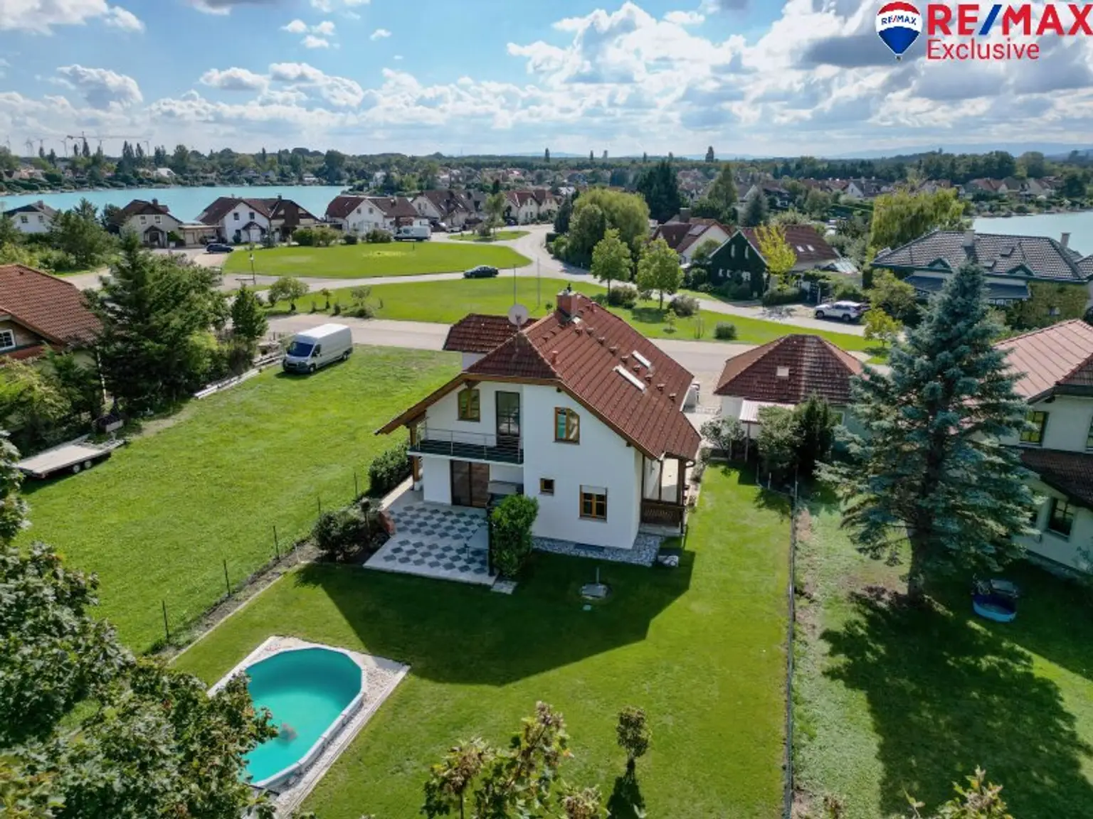 Seezauber – Einfamilienhaus auf ca. 120 m² Wfl. am Schloßsee in 2ter Reihe zu kaufen!