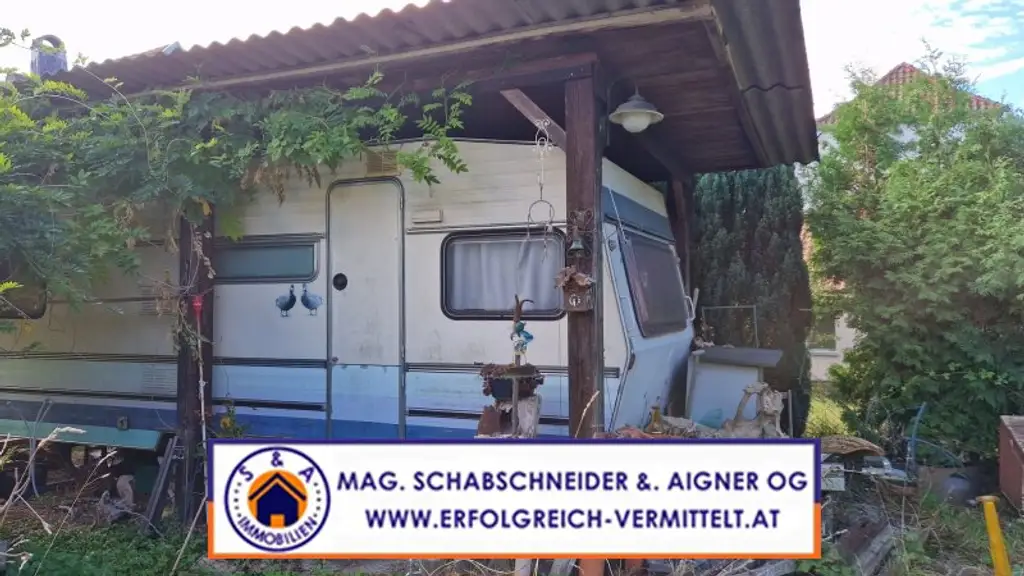 Kleines Stadthaus zum Renovieren mit ruhigem Garten mitten im Zentrum!