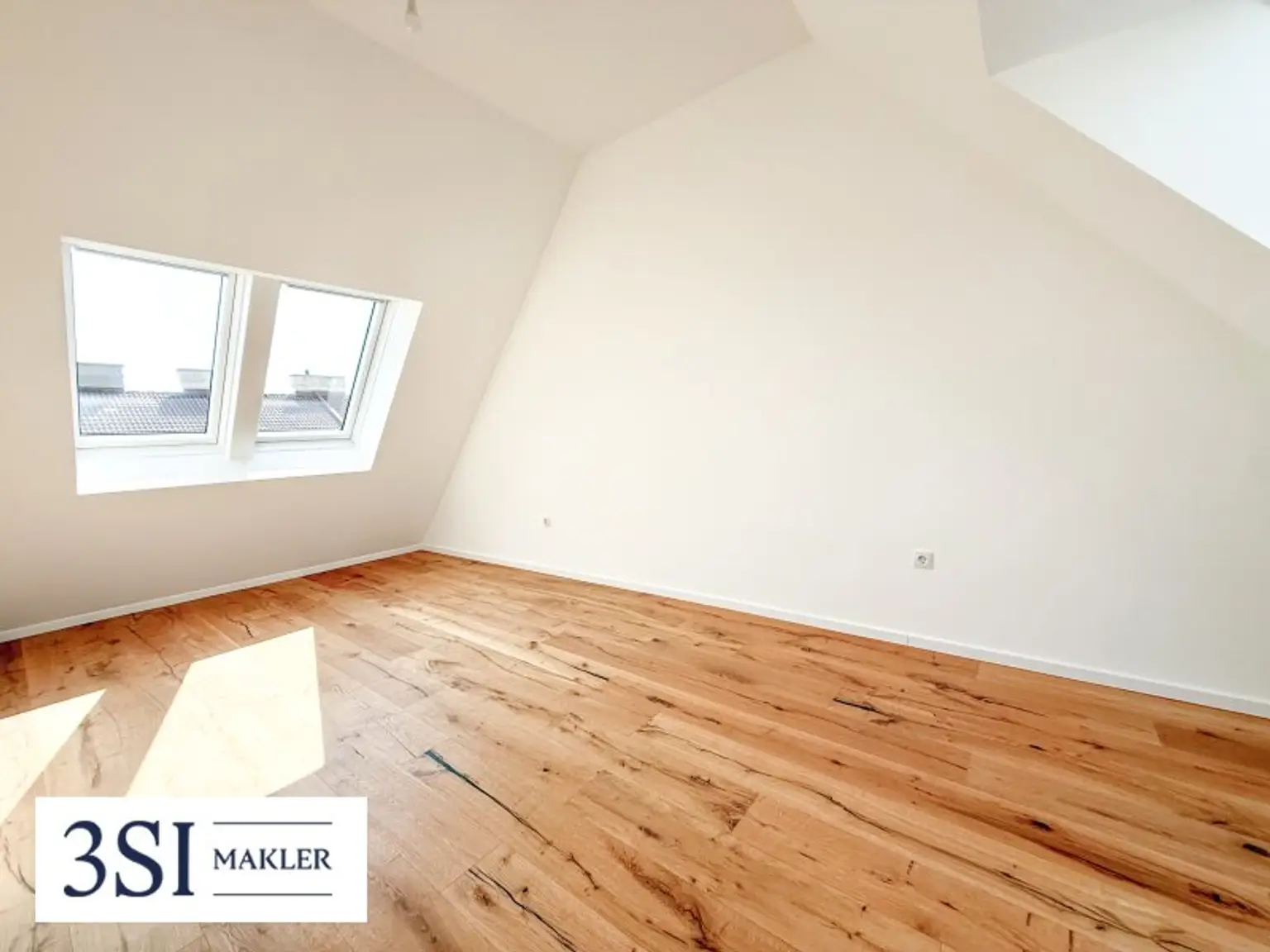 Leben mit Freiraum – Dachgeschosswohnung mit sonniger Terrasse & edler Ausstattung