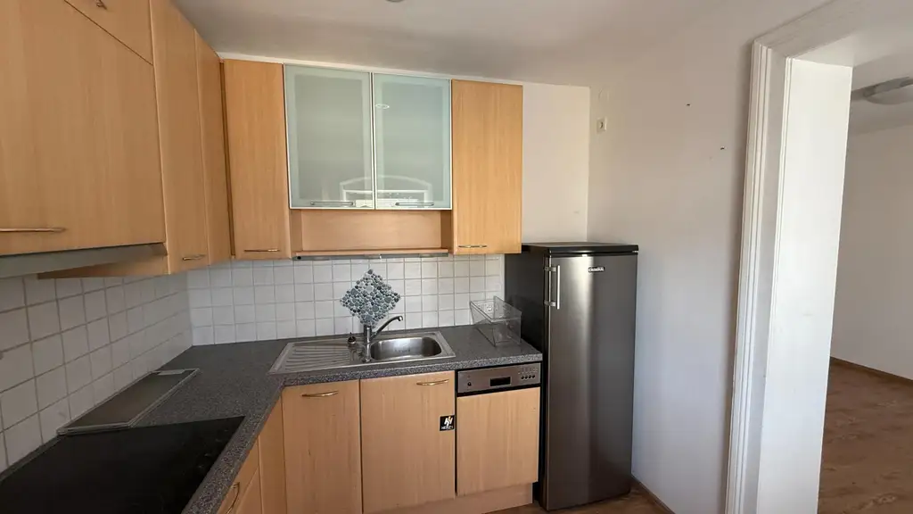 Zentrale 2-Zimmer-Wohnung mit Gartennutzung!
