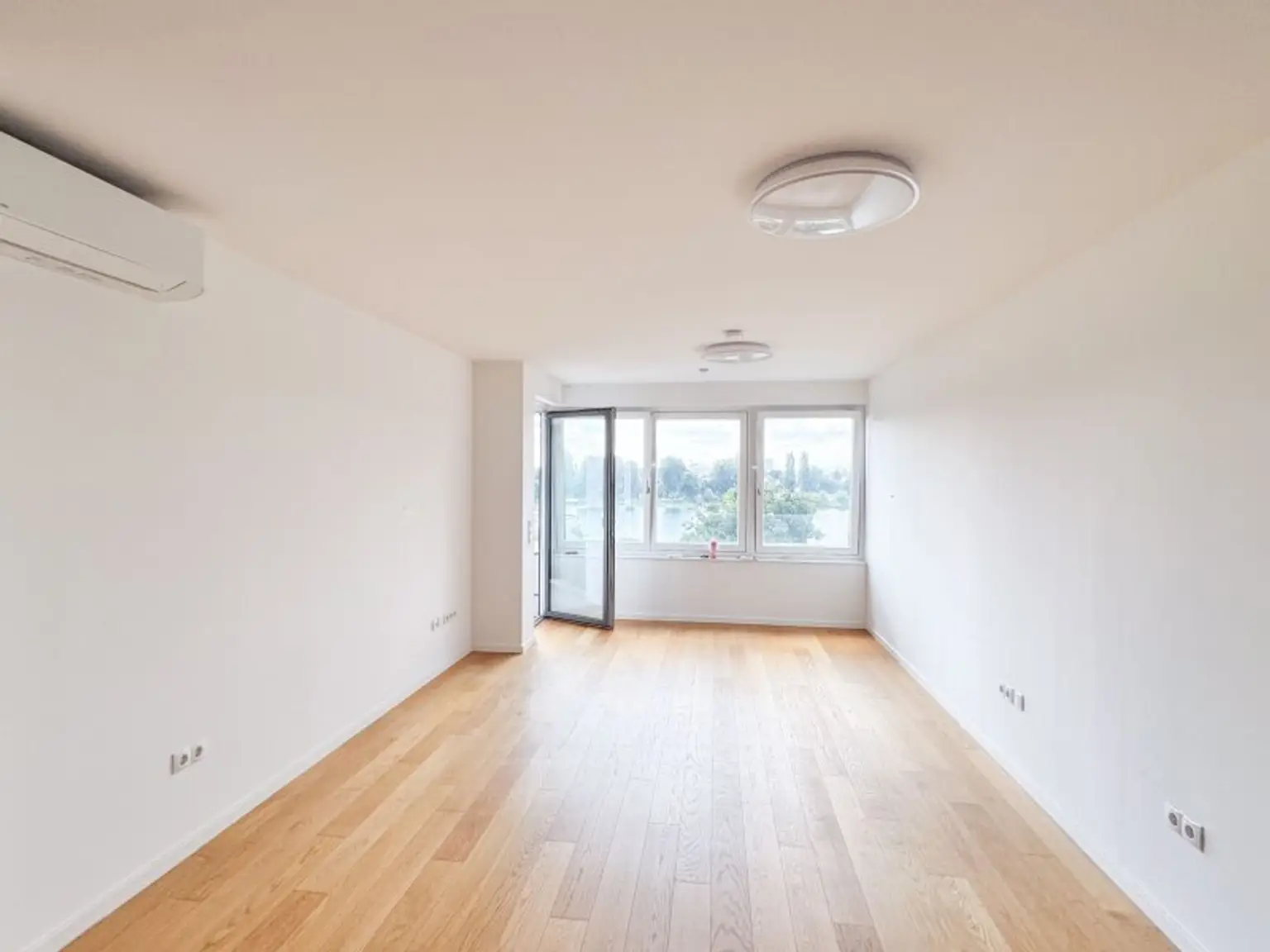 3-Zimmer-Wohnung mit Balkon & Blick auf die Alte Donau – Top-Zustand, klimatisiert, zentral begehbar!