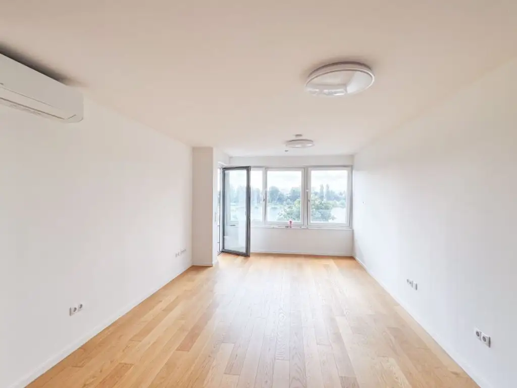 3-Zimmer-Wohnung mit Balkon & Blick auf die Alte Donau – Top-Zustand, klimatisiert, zentral begehbar!