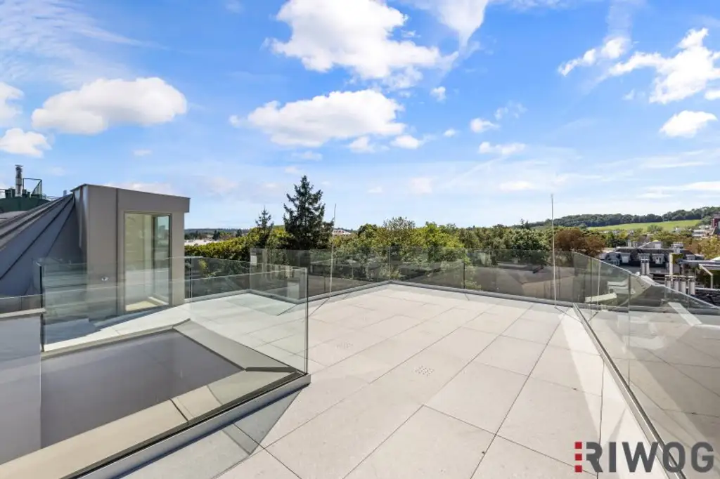 3,7m Raumhöhe im DG, Garage mit 2 Stellplätze, Atrium, Aufzug in die Wohnung und 360° Dachterrasse
