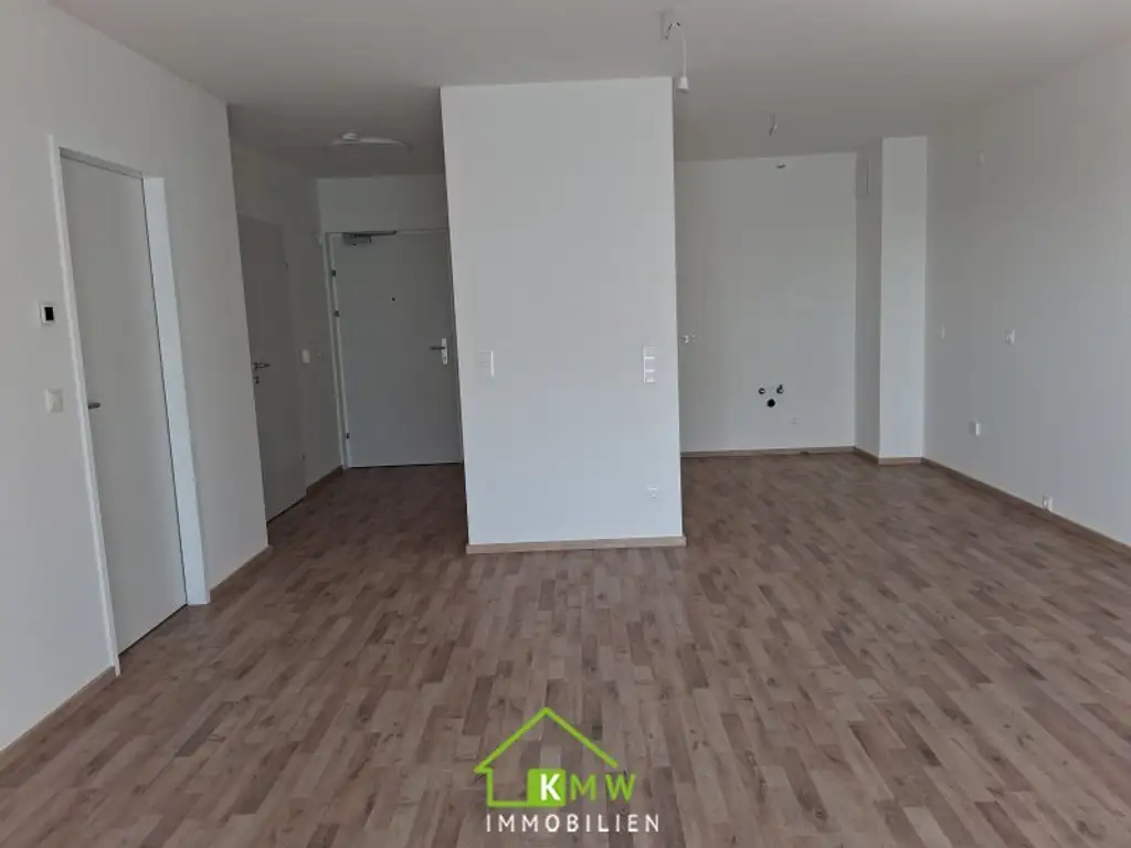 Erstbezug - Lichtdurchflutete 2 Zimmer Neubauwohnung mit Fernblick, Balkon & Tiefgaragenplatz