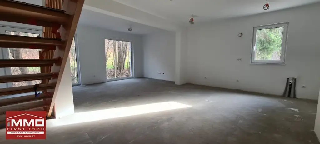 ***ERSTBEZUGS-DOPPELHAUSHÄLFTE DIREKT AM WASSER MIT SÜD-GARTEN!***