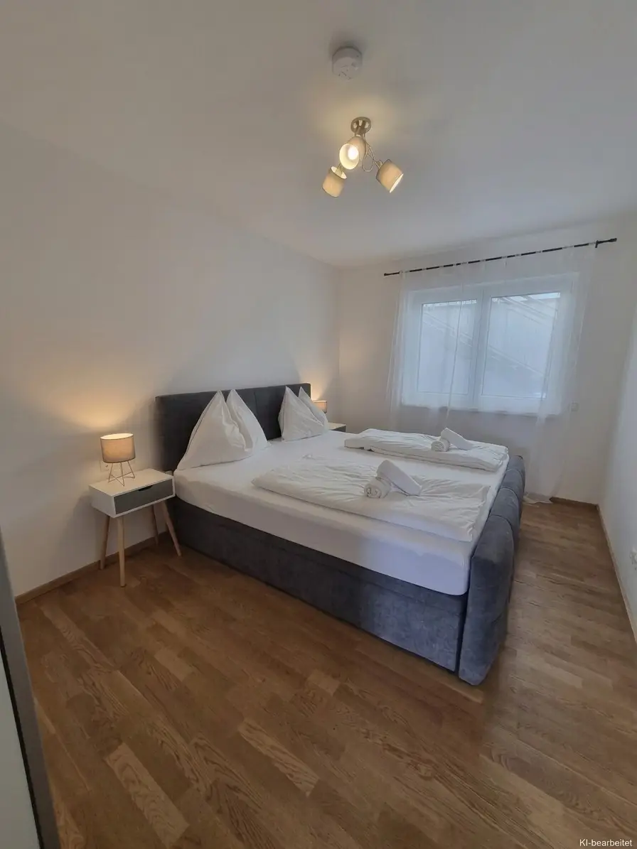 Ca. 64 m² Wohnung mit ca. 107 m² Eigengarten & Klimaanlage - Perfekt als Haupt- od. Zweitwohnsitz - Lebensqualität zwischen See und Reben