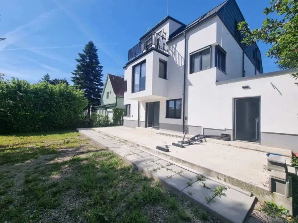 Privilegiertes Wohnen am Rosenhügel - Elegante Maisonette inkl. Garten im Architektenhaus | Erstbezug!