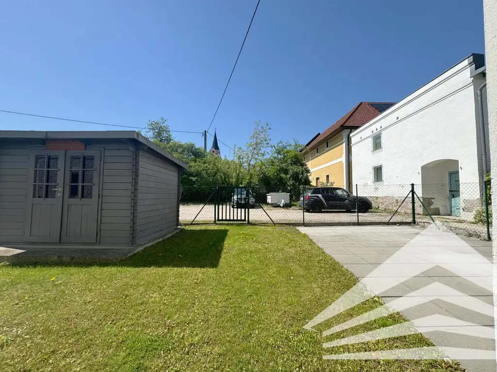 Hochwertig renovierte 2 Zimmerwohnung mit Küche & Privatgarten in Thening zu mieten