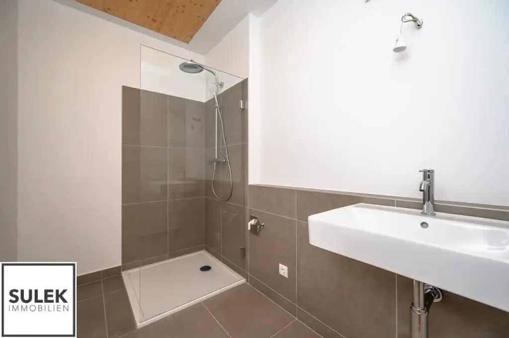 Erstbezug: 3-Zimmer-Maisonette mit hofseitiger Terrasse