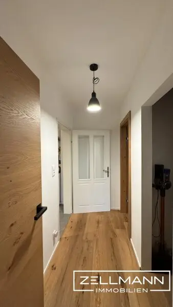 Wohnen am Puls von Mauer – Exklusive Maisonette mit Terrasse und Stil | ZELLMANN IMMOBILIEN