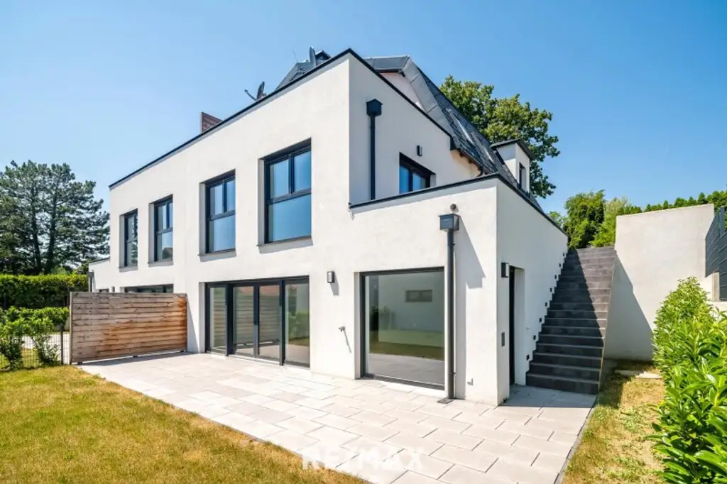 Erstbezug: Großzügiger Familientraum mit unverbaubarem Grünblick!