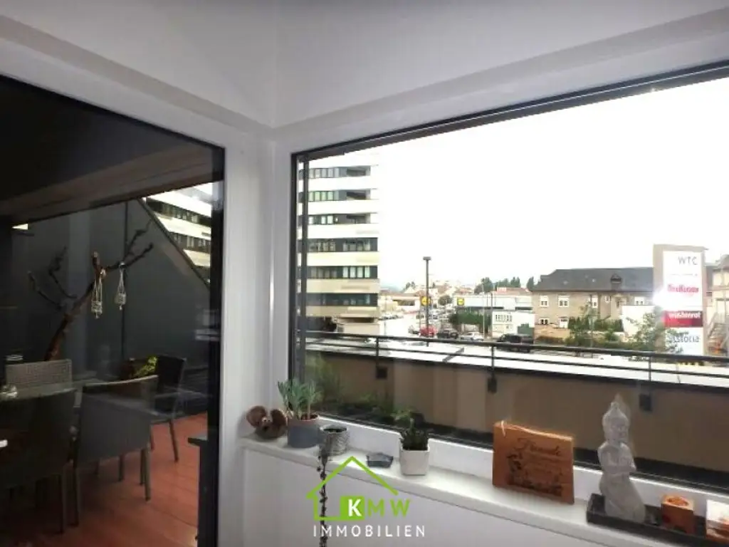 Lichtdurchflutete, moderne 2 Zimmer Wohnung mit Terrasse und 2 Tiefgaragenplätze