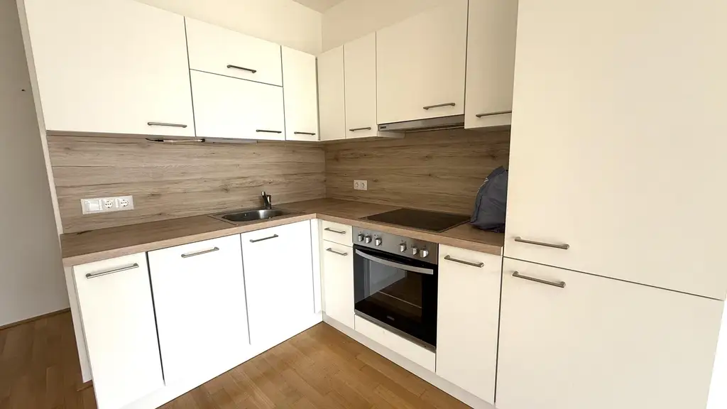 Moderne Neubauwohnung mit EIGENGARTEN und TERRASSE nahe Akademiepark