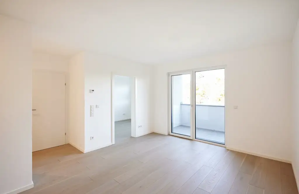 ERSTBEZUG!  4-Zimmer-Wohnung mit Balkon und Parkblick nahe der Donau!