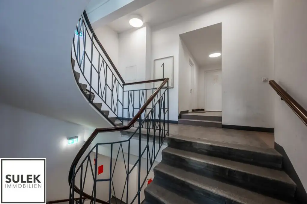 Einzigartige DG-Wohnung mit Loft-Charakter und Terrassen (rd. 165m²) inkl. atemberaubendem Fernblick