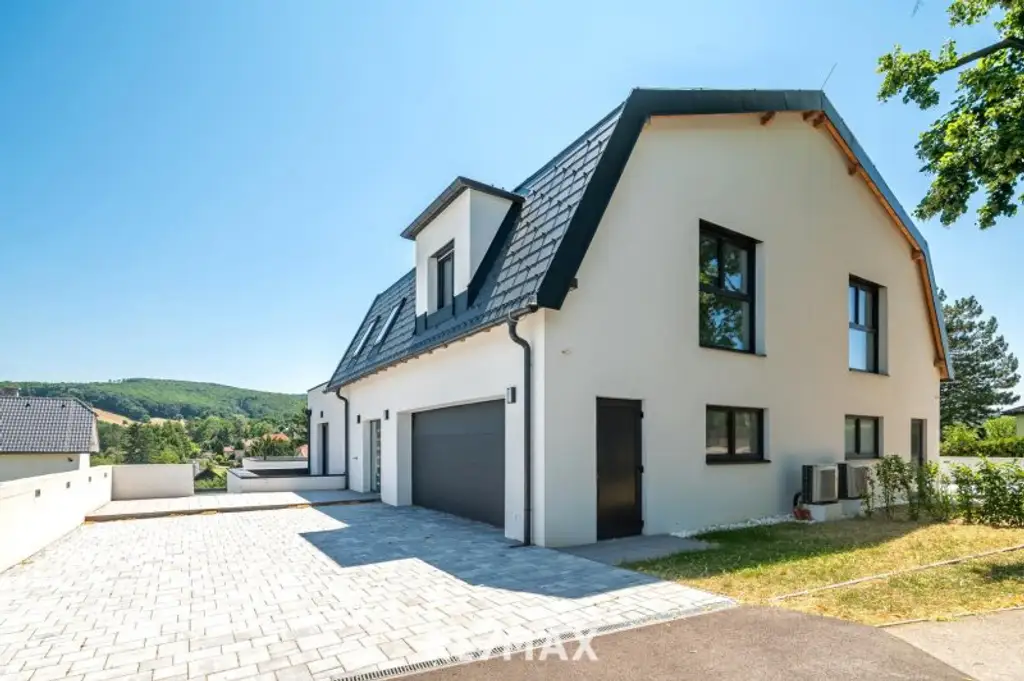 Erstbezug: Großzügiger Familientraum mit unverbaubarem Grünblick!