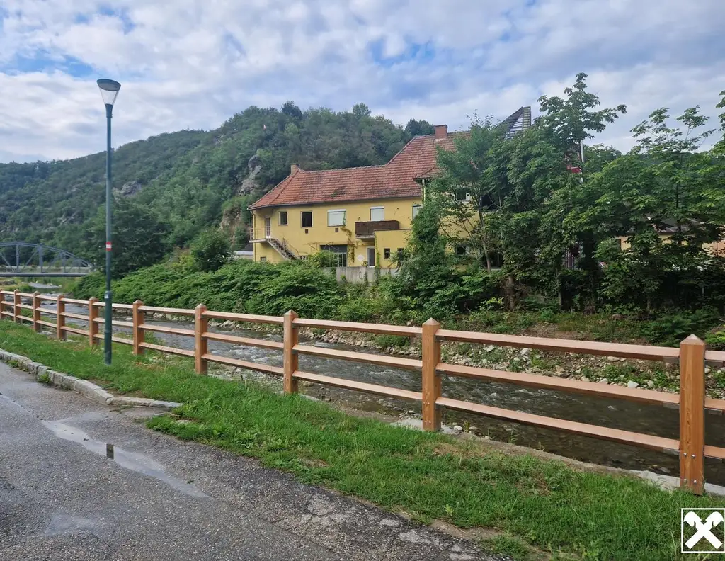 EINE SELTENE GELEGENHEIT: BAUGRUNDSTÜCK MIT EIGENEM WALD MIT HERRLICHEM AUSBLICK DIREKT AM WASSER