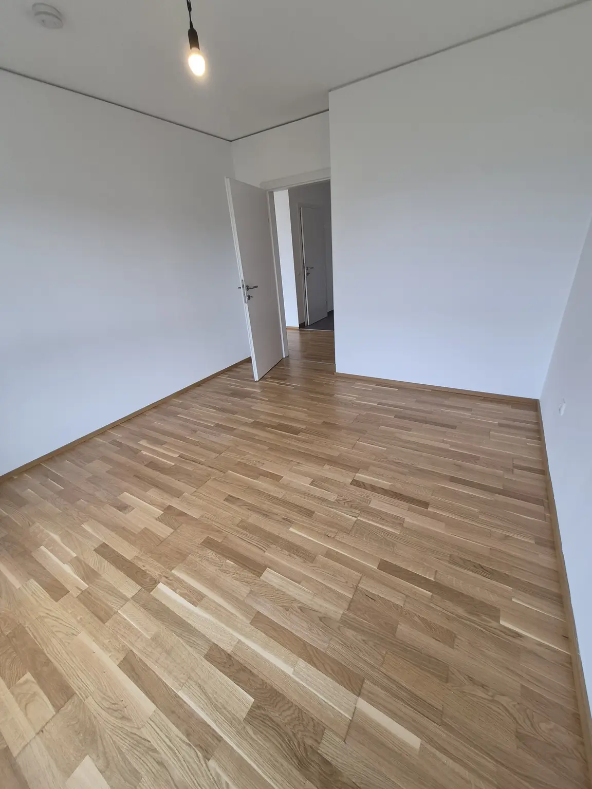 Neubau: Besonders ansprechende 54 m² 2-Zimmerwohnung mit 28 m² Garten