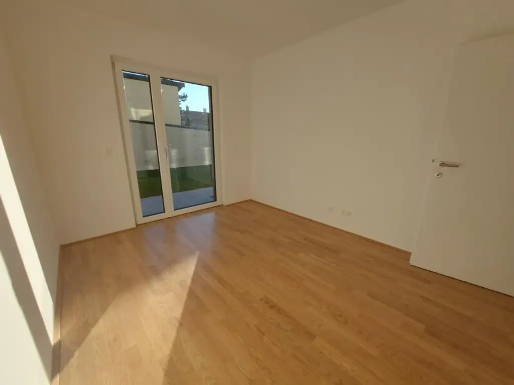 3-Zimmer-Erdgeschoßwohnung mit Terrasse und Tiefgaragenstellplatz (Top 02)