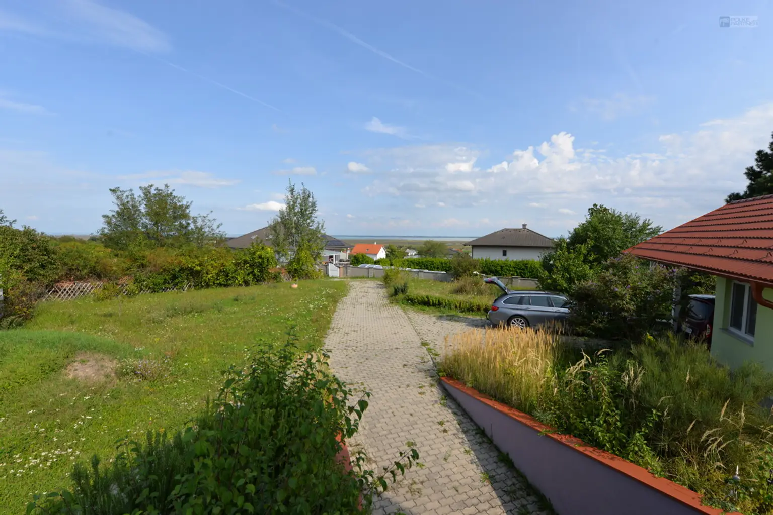 SE(H)ENSUCHT: SIEH DEN SEE!   EINFAMILIENHAUS IN MÖRBISCH MIT SEEBLICK, CARPORT & SOMMERKÜCHE