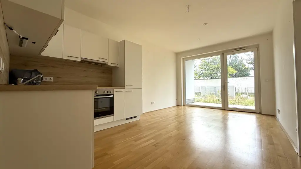 Moderne Neubauwohnung mit EIGENGARTEN und TERRASSE nahe Akademiepark