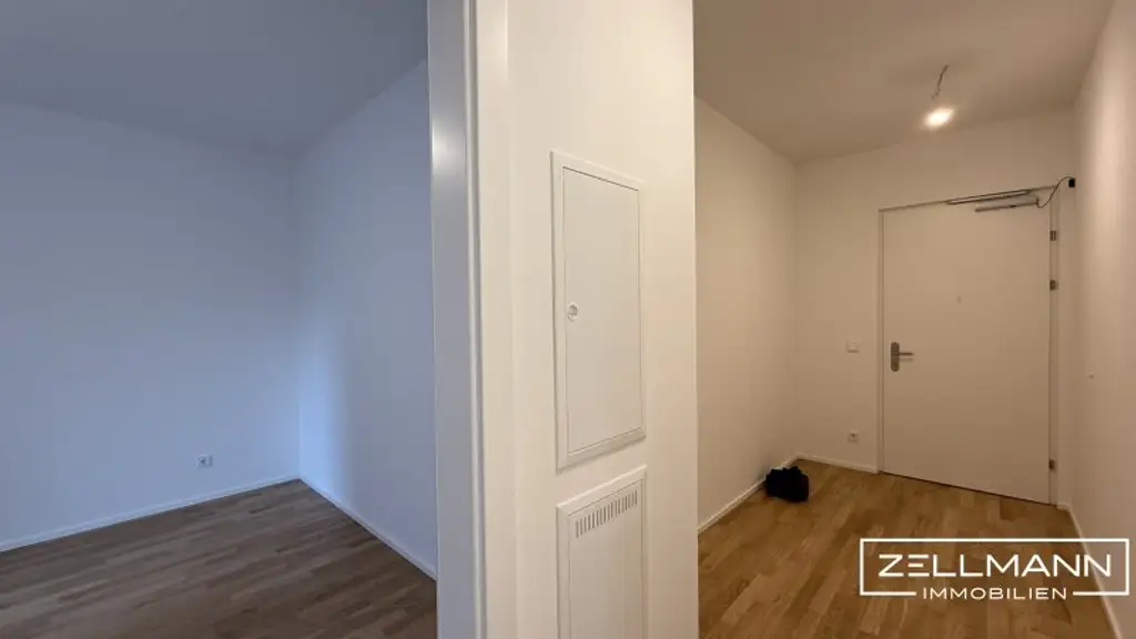 Rückzugsort über den Dächern – Erstbezug mit Loggia & Gemeinschaftsterrasse | ZELLMANN IMMOBILIEN