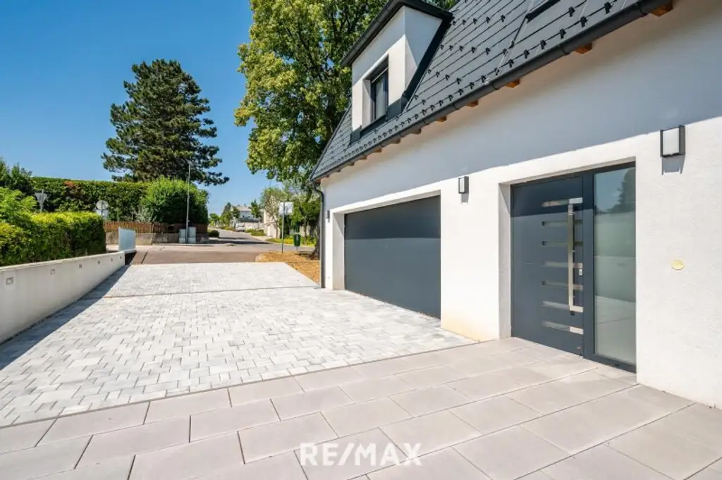 Erstbezug: Großzügiger Familientraum mit unverbaubarem Grünblick!