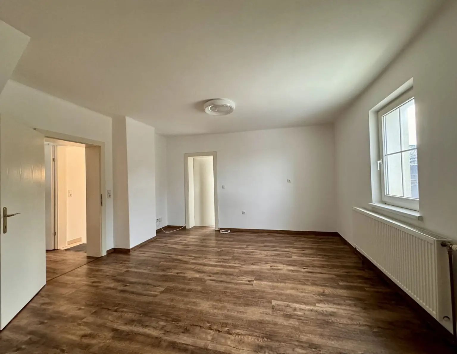 Dachgeschoss trifft Design - wohnen im Herzen von Pettenbach.
