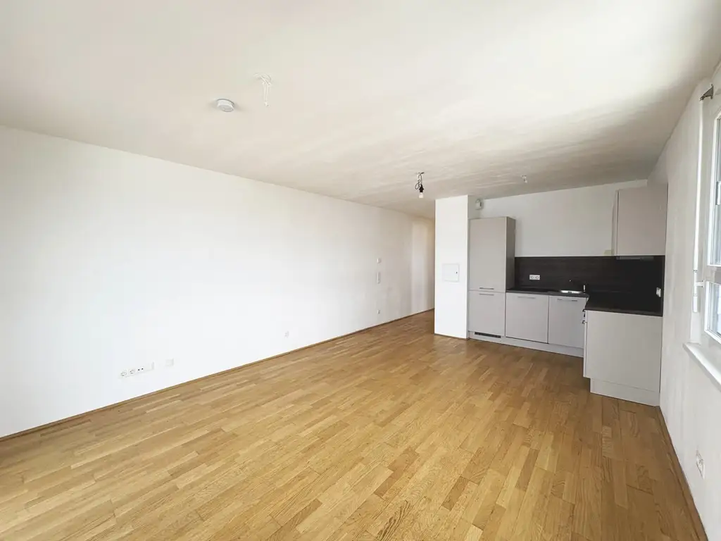 Q11 Leben in Simmering - 
3-Zimmer-Loggiawohnung mit Deckenkühlung - genießen Sie DIESEN Ausblick!