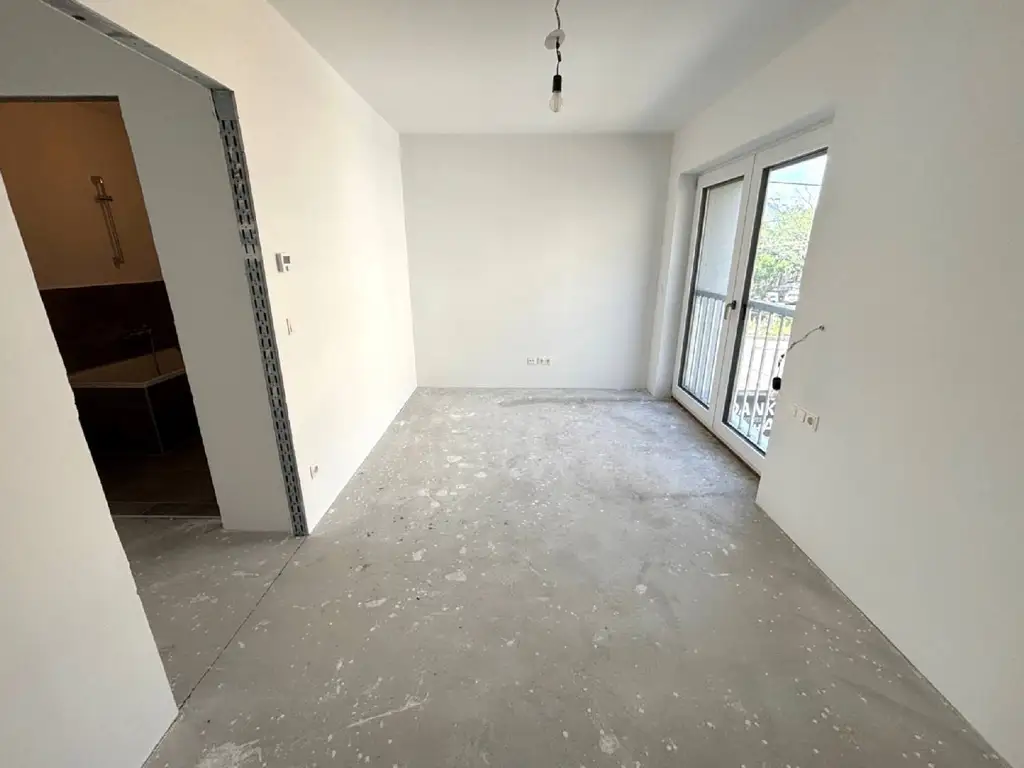 Grünblick & Cityflair: 51m² Neubau mit Balkon & Sauna Nähe Meiselmarkt