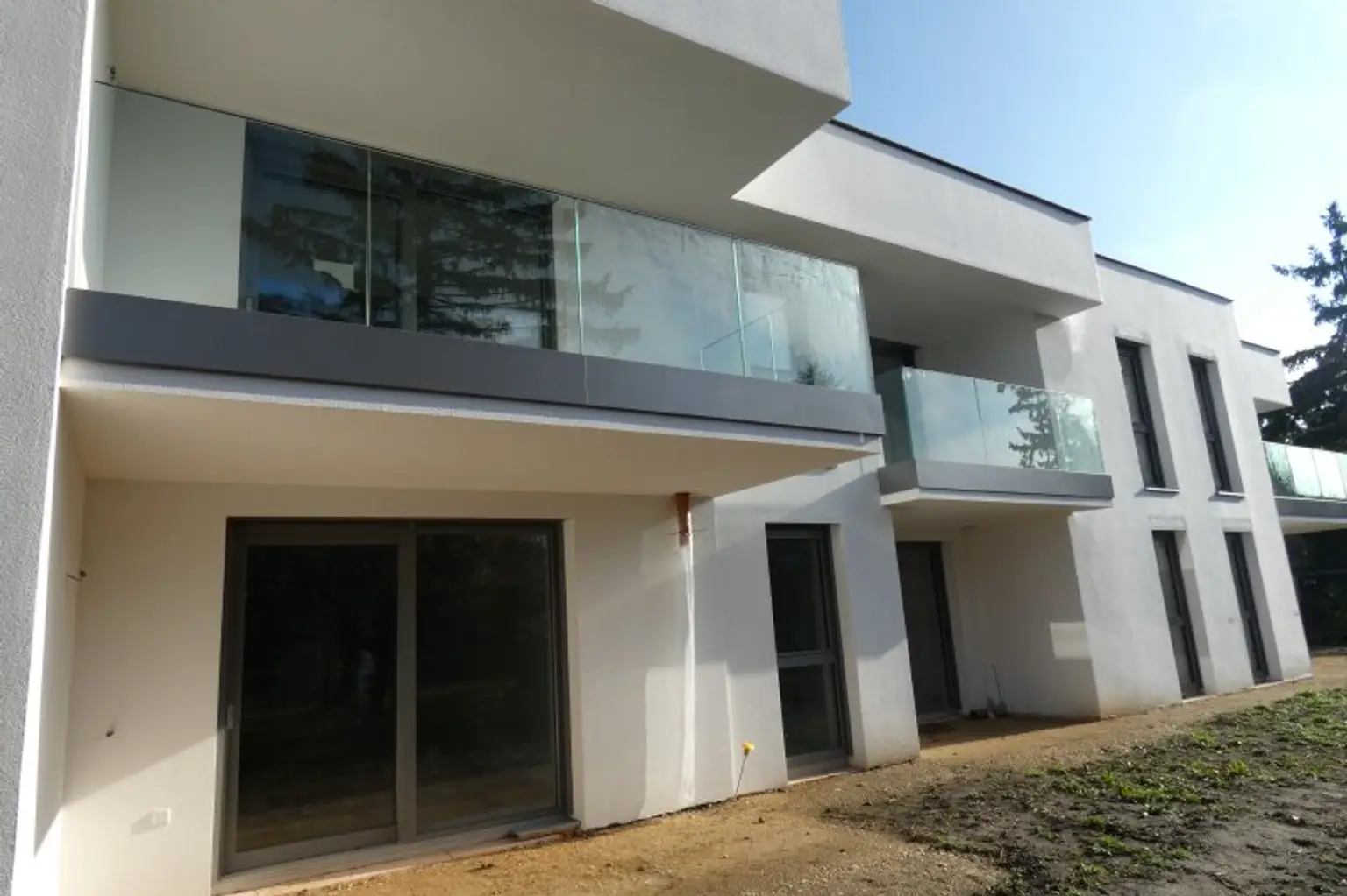 NIEDRIGENERGIE NEUBAUWOHNUNG MIT GARTEN BEREITS BELAGSFERTIG