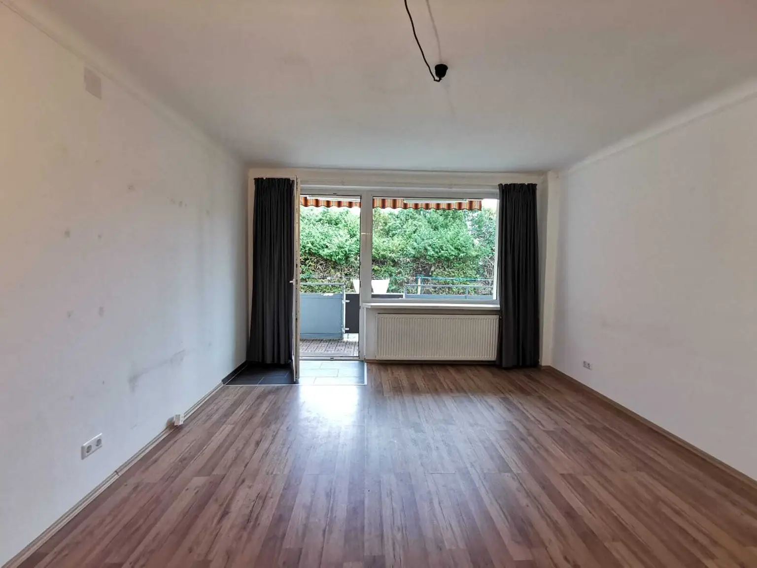 Sonnige 3 Zimmer Wohnung mit Gartenbenützung