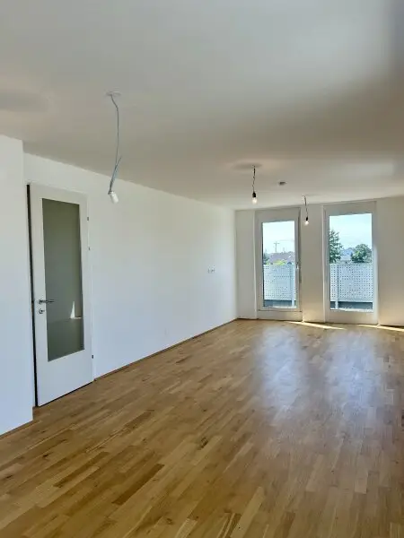 Traumhafte Dachgeschosswohnung in 1230 Wien – Erstbezug mit Balkon und Terrassen!