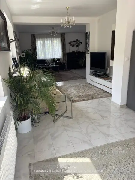 NEUWERTIGES EINFAMILIENHAUS AUF WUNDERSCHÖNEN GRUNDSTÜCK IN SONNIGER, RUHIGER SIEDLUNGSLAGE
