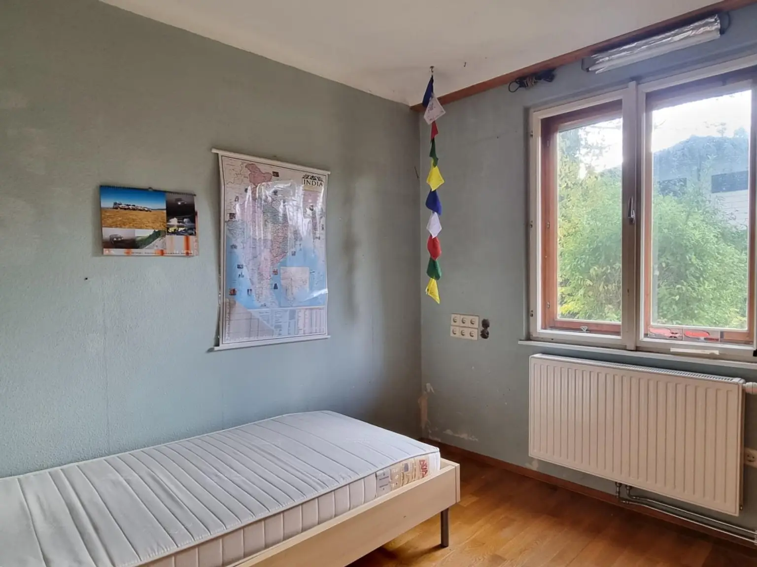 GERÄUMIGES EIN / ZWEIFAMILIENHAUS IN SONNIGER LAGE