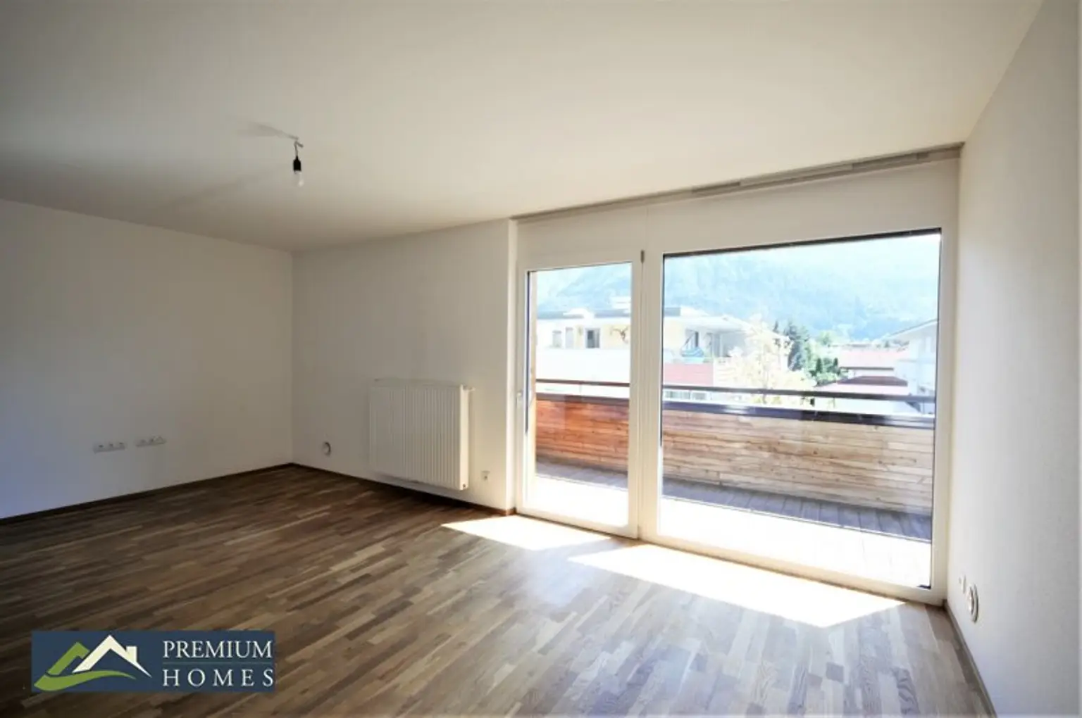 Mietwohnung Kundl: K1 _Der Gipfel des Wohnens Top 5_ 59,37 m²_Eingangtür_Wohnzimmer