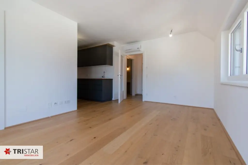 Moderne Dachgeschoßwohnung in 1220 Wien - Erstbezug mit Terrasse und Fußbodenheizung!