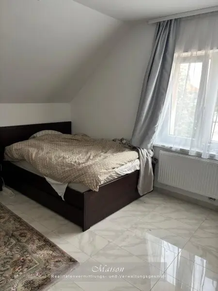 NEUWERTIGES EINFAMILIENHAUS AUF WUNDERSCHÖNEN GRUNDSTÜCK IN SONNIGER, RUHIGER SIEDLUNGSLAGE