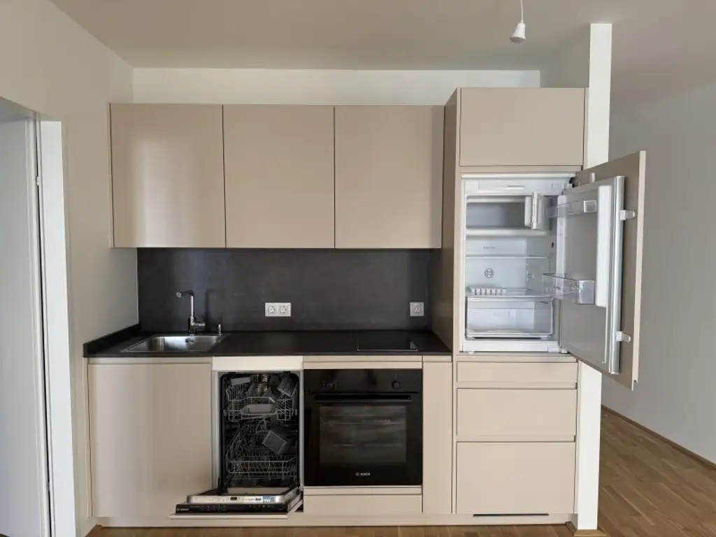 Erstbezug - 2 Zimmerwohnung I Nähe Donau I ca. 5,5m²  Balkon I hochwertige Küche I Tiefgarage I Fußbodenheizung I