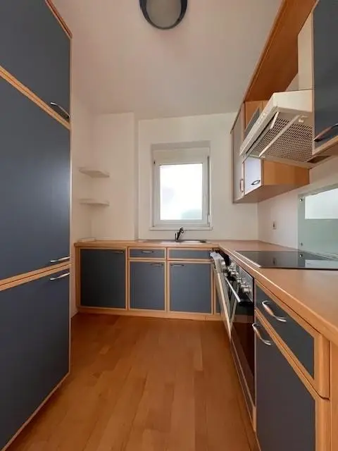 Tolle 2-Zimmer-Wohnung mit Eigengarten, Loggia und TG-Platz zu verkaufen