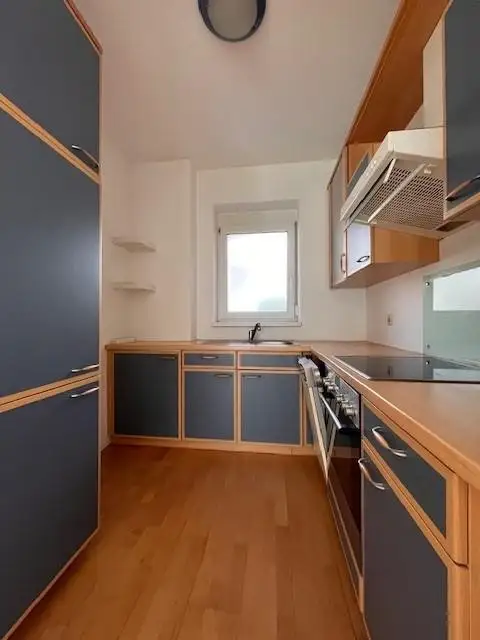 Tolle 2-Zimmer-Wohnung mit Eigengarten, Loggia und TG-Platz zu verkaufen