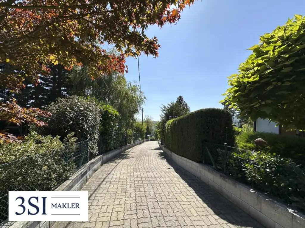 Traumhaftes Wohnen: Bungalow mit Pool & zusätzlichem Grundstück