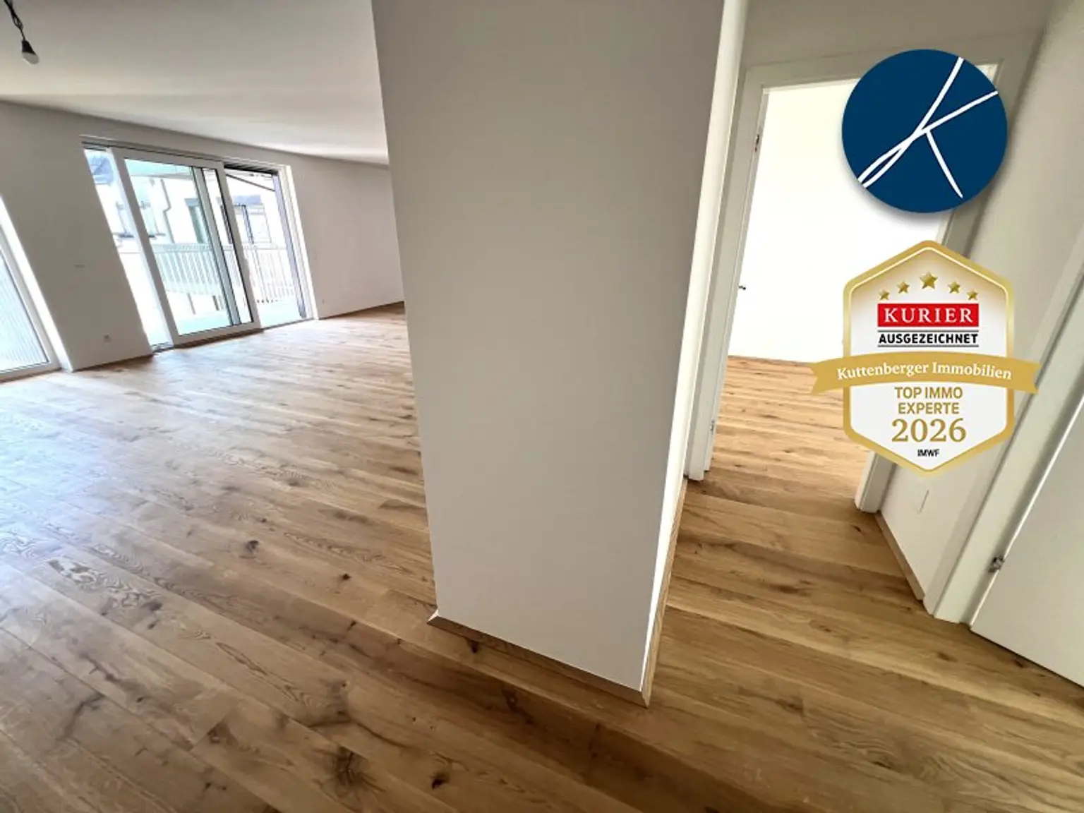 Wohnküche und Gang zu den Zimmern